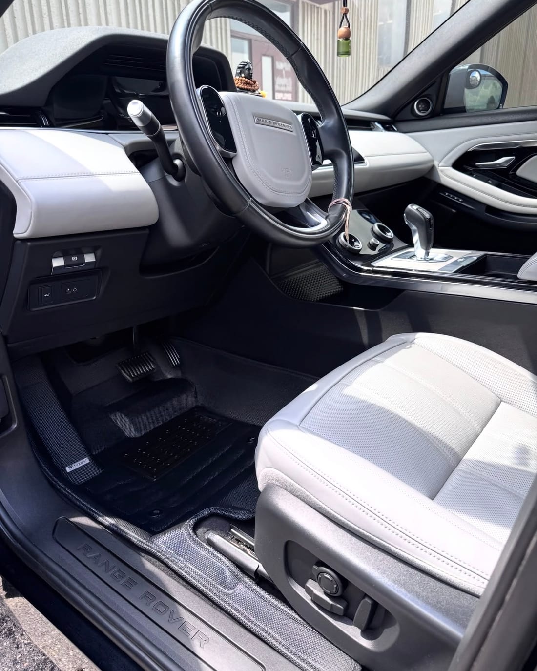 The same cabin after an interior detail, mats and door sill clean